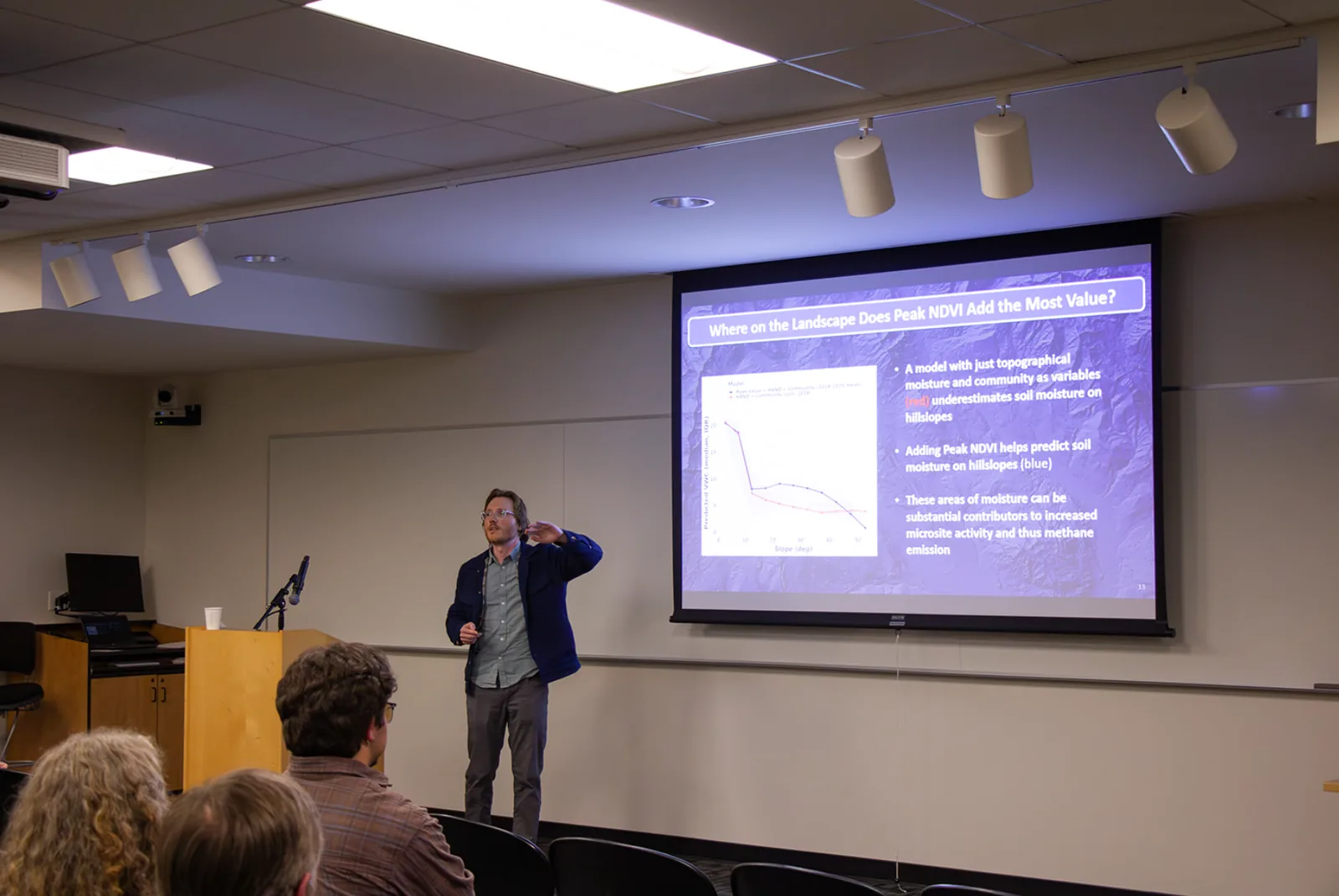 Edward Turk presenting his master's thesis.